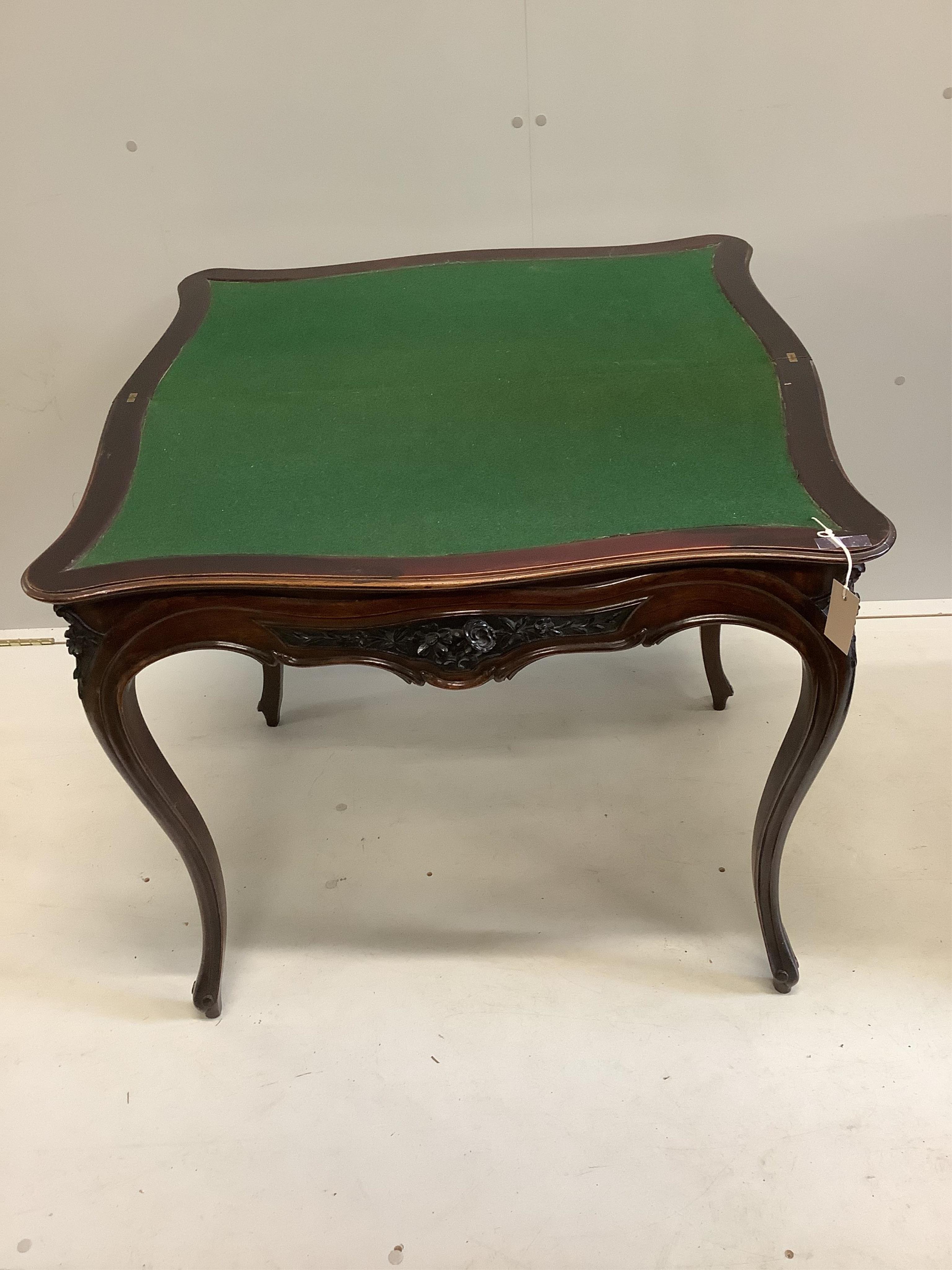 A 19th century French rosewood folding card table, width 84cm, depth 43cm, height 75cm